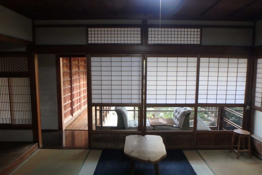 きたまちの家｜大きな吹き抜けのある納屋を快適な住まいに。